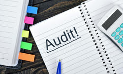 © - fotolia.com Audit text on notepad